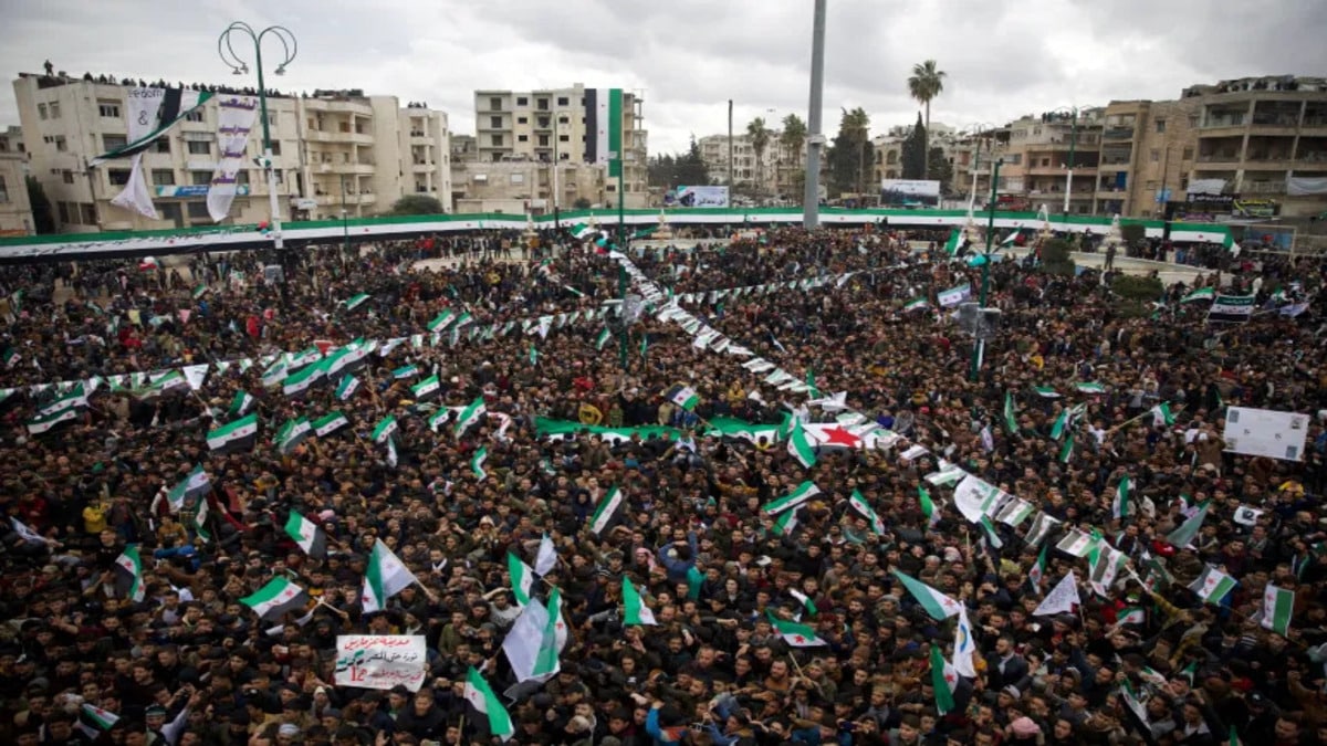 People gather in Idlib city to c