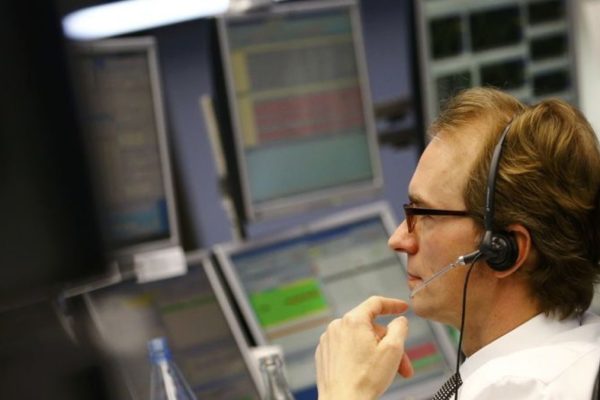 Fed official urges caution on interest rate cuts