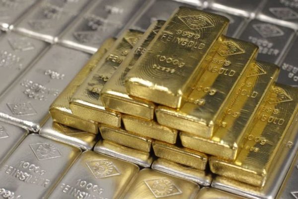 Gold and Silver shine as markets react to Fed and Economic News