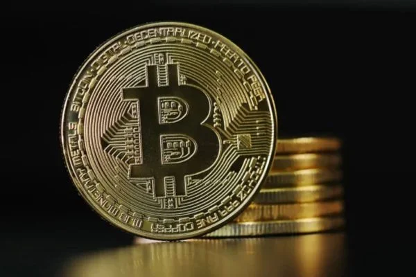Bitcoin sinks below $70,000 as risk-off sentiment rattles crypto markets