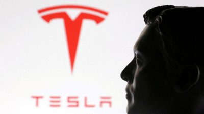Tesla stock jumps 8 percent after AI5 chip tape out as Microsoft rises 3.7%