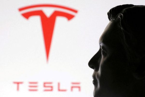 Tesla stock jumps 8 percent after AI5 chip tape out as Microsoft rises 3.7%