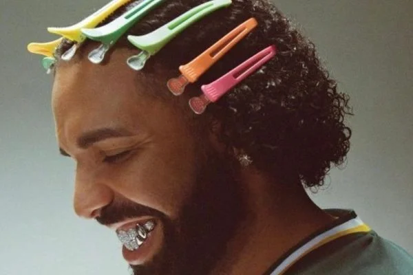 Drake makes UK chart history with three albums simultaneously in top 10