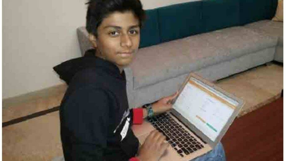 Akshat Mittal at the age of 13 working on his first project.