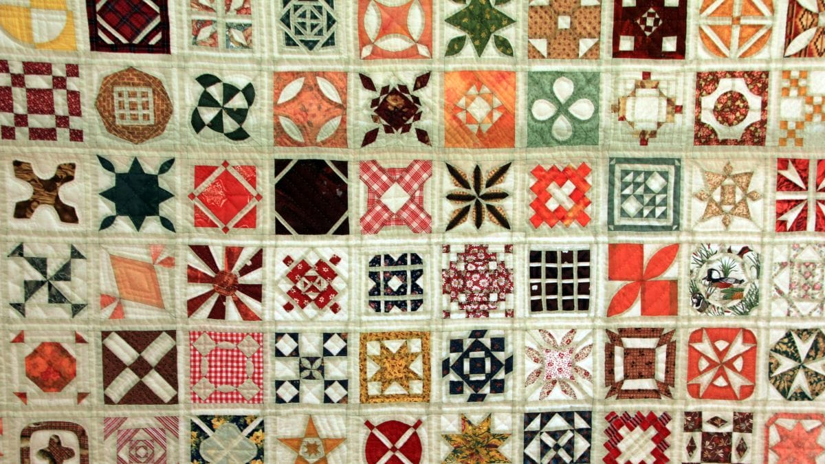 What is Applique and how is it different from Patchwork?